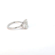 Emerald Cut Diamond Three-Stone Ring in White Gold