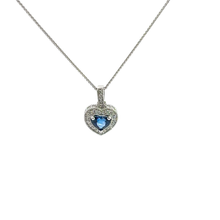 Blue Sapphire Heart Halo Pendant in White Gold