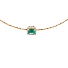 Emerald Halo Pendant on Yellow Gold Beaded Necklace