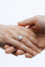 Emerald Cut Diamond Three-Stone Ring in White Gold