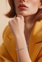 Diamond Accent Hinged Bangle in Yellow Gold
