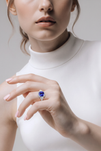 A Tanzanite multi-stone ring set in white gold.