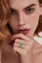 Oval Emerald Double Halo Ring in White Gold