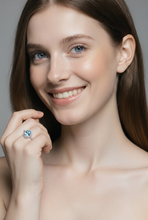 Oval Aquamarine Halo Ring in White Gold