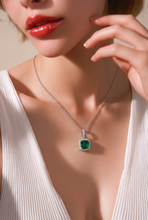 Emerald Halo Pendant Necklace in White Gold