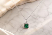 Emerald Halo Pendant Necklace in White Gold