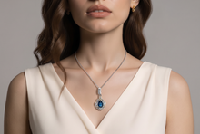 Royal Blue Sapphire Pear Halo Pendant in White Gold