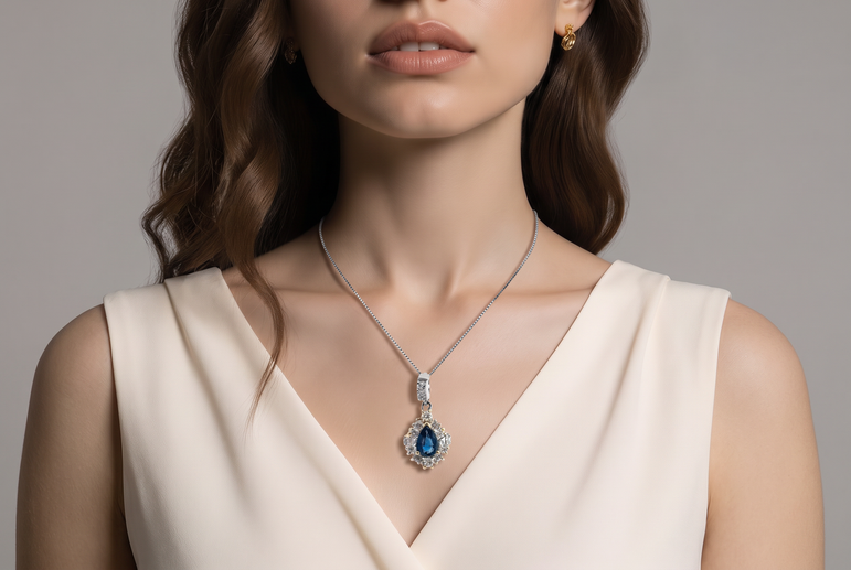 Royal Blue Sapphire Pear Halo Pendant in White Gold