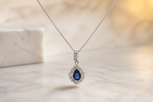 Royal Blue Sapphire Pear Halo Pendant in White Gold