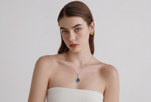Royal Blue Sapphire Halo Pendant Necklace in White Gold