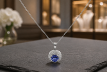 Round Tanzanite Halo Pendant Necklace in White Gold