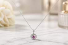 Purplish-Red Ruby Octagonal Halo Pendant in White Gold