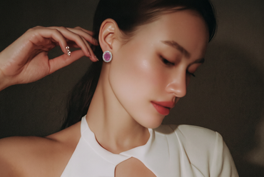 Oval Ruby and White Gold Halo Stud Earrings