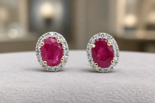 Oval Ruby and White Gold Halo Stud Earrings