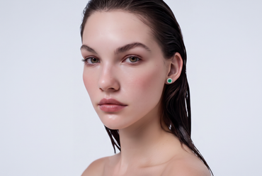Round Emerald and Halo Stud Earrings in White Gold