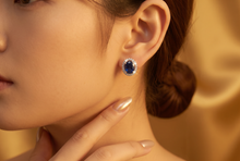 Royal Blue Sapphire Halo Stud Earrings in White Gold