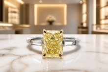 Fancy Intense Yellow Diamond Three-Stone Engagement Ring