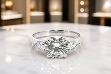 Round Three-Stone Diamond Ring in White Gold