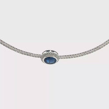 Blue Sapphire and Diamond Halo Necklace in White Gold