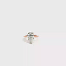 Gold Solitaire Ring with Pear Cut Diamond