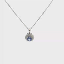Round Tanzanite Halo Pendant Necklace in White Gold
